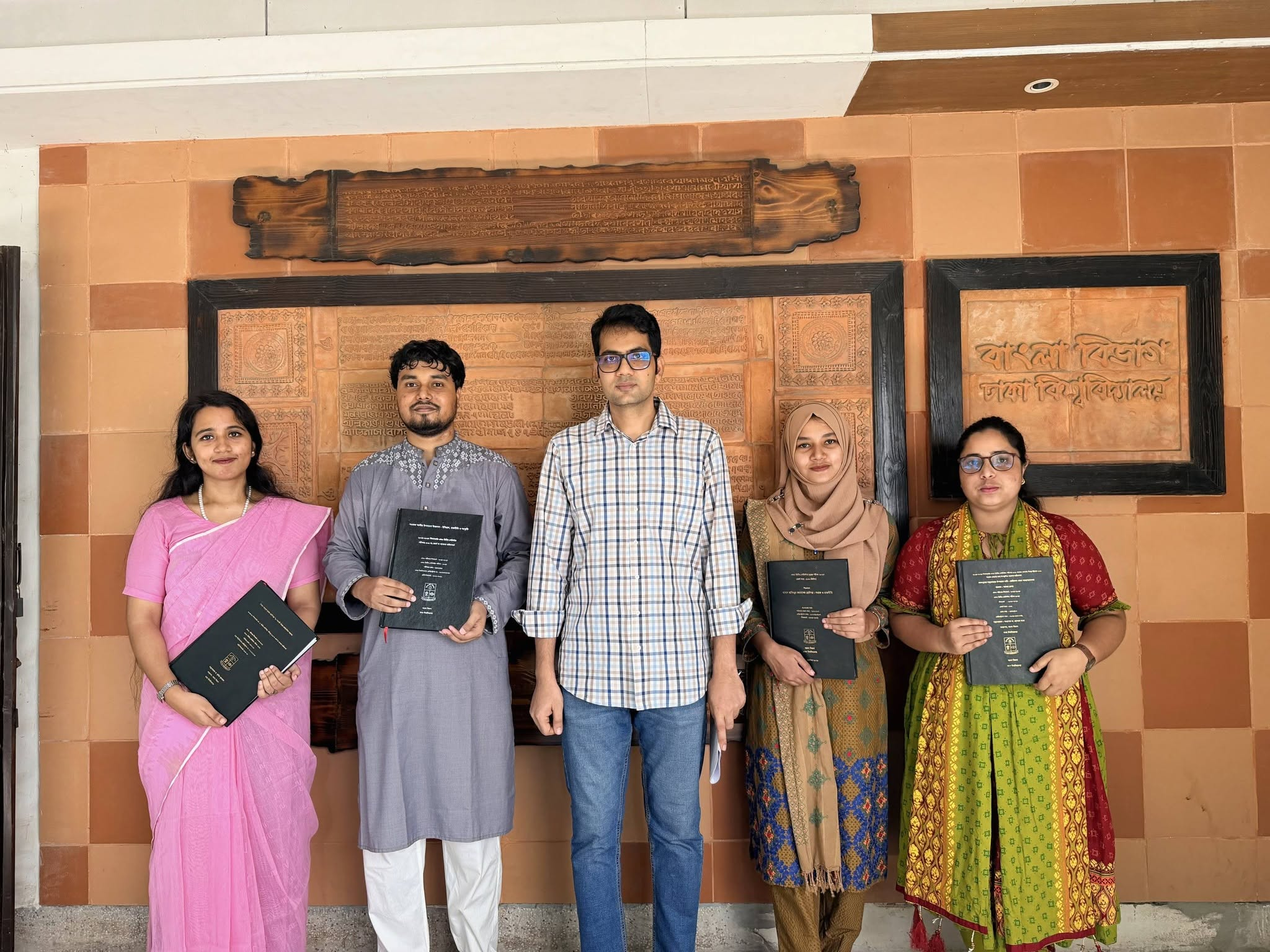 With master’s students on thesis submission day, 28 September 2026
